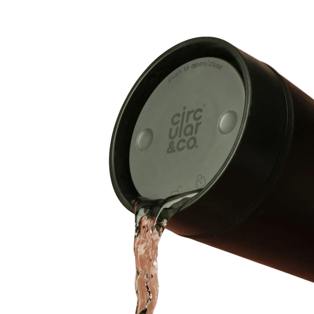 Reusable coffee cup from coffee waste with a lid designed for easy opening and closing.