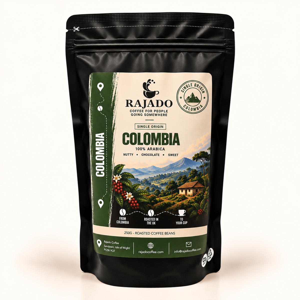 A black stand-up pouch of Rajado Coffee for People Colombia Single Origin 100% Arabica Roasted Coffee Beans, featuring a detailed label with a coffee plantation illustration and product details, set against a plain white background.