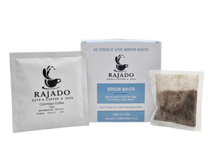 Coffee brew bags by Rajado showcased in packaging with one brew bag open to reveal coffee grounds inside.