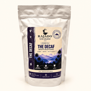 A stand-up pouch of Rajado Coffee Roasters 'The Decaf' smooth decaf blend, set against a plain off-white background.